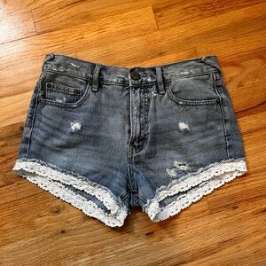 Free People Distressed Denim Shorts with White Lace Trim